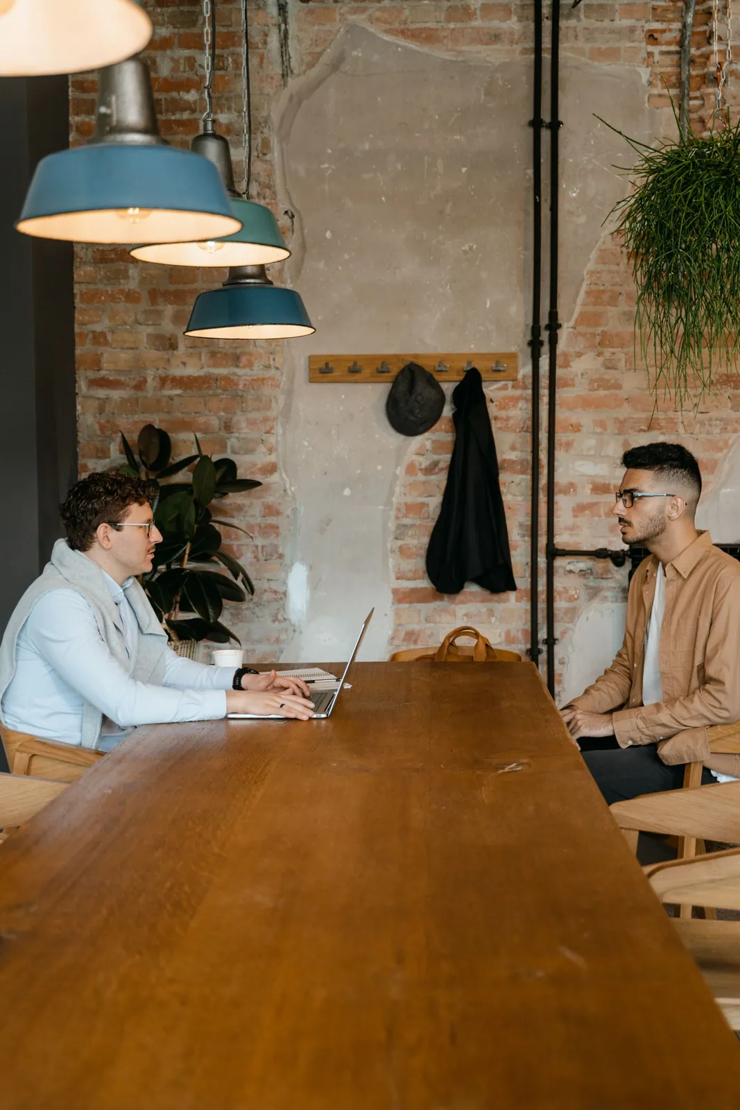 Interviewer meeting a job candidate in an office